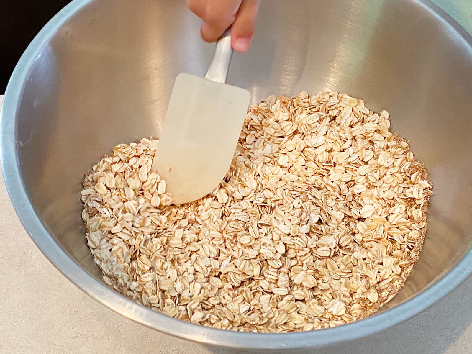 Combining the dry ingredients.