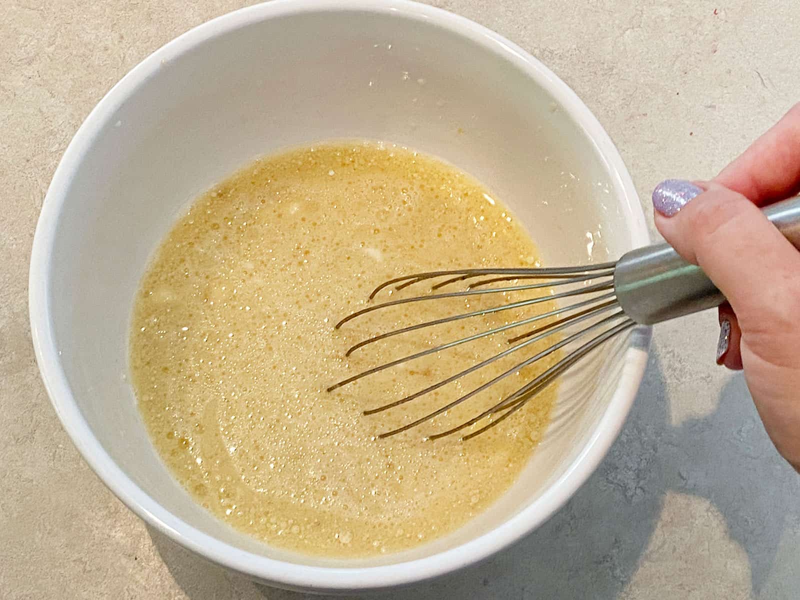 Combining the wet ingredients.