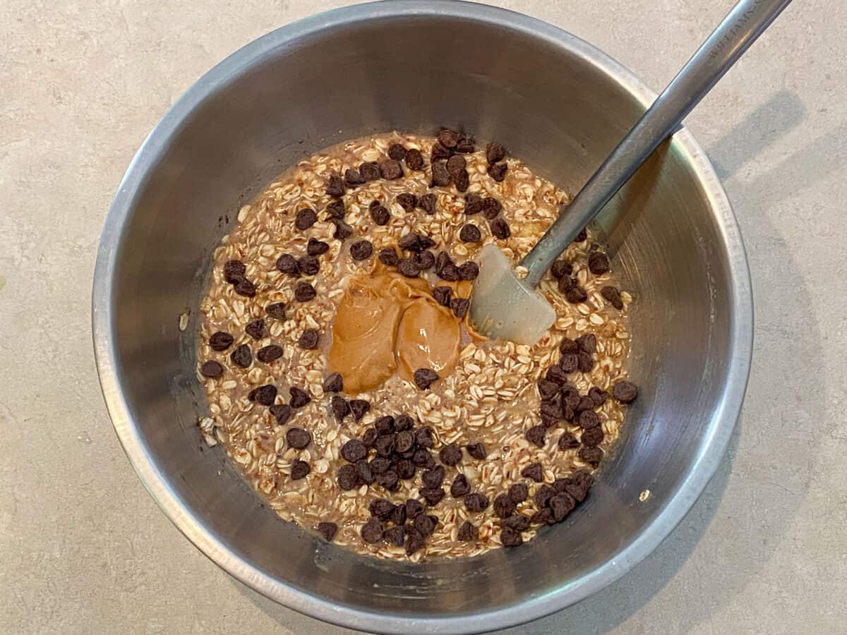 Adding peanut butter and chocolate chips to the oatmeal batter