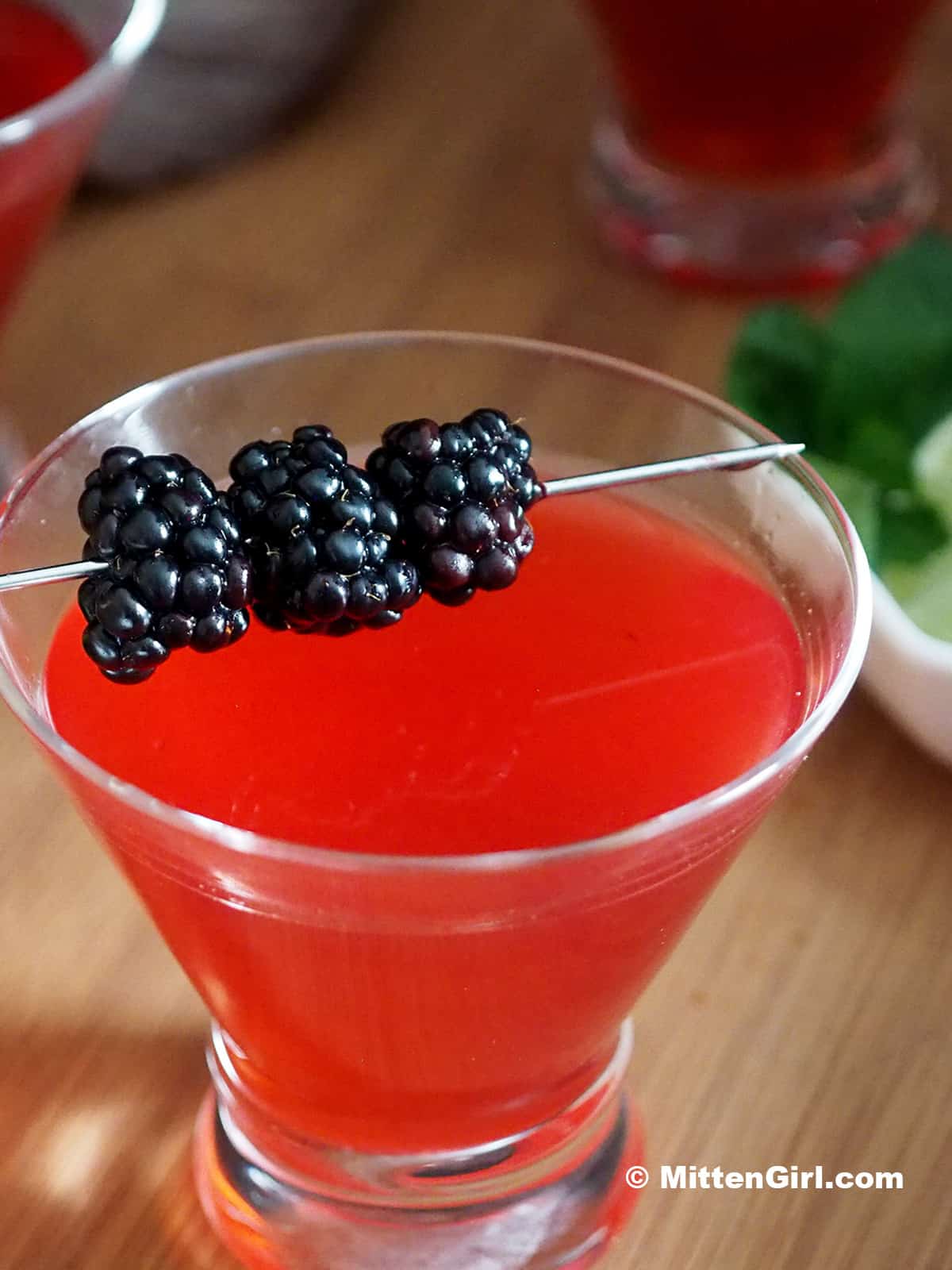 Blackberry vanilla martini with fresh berries. 