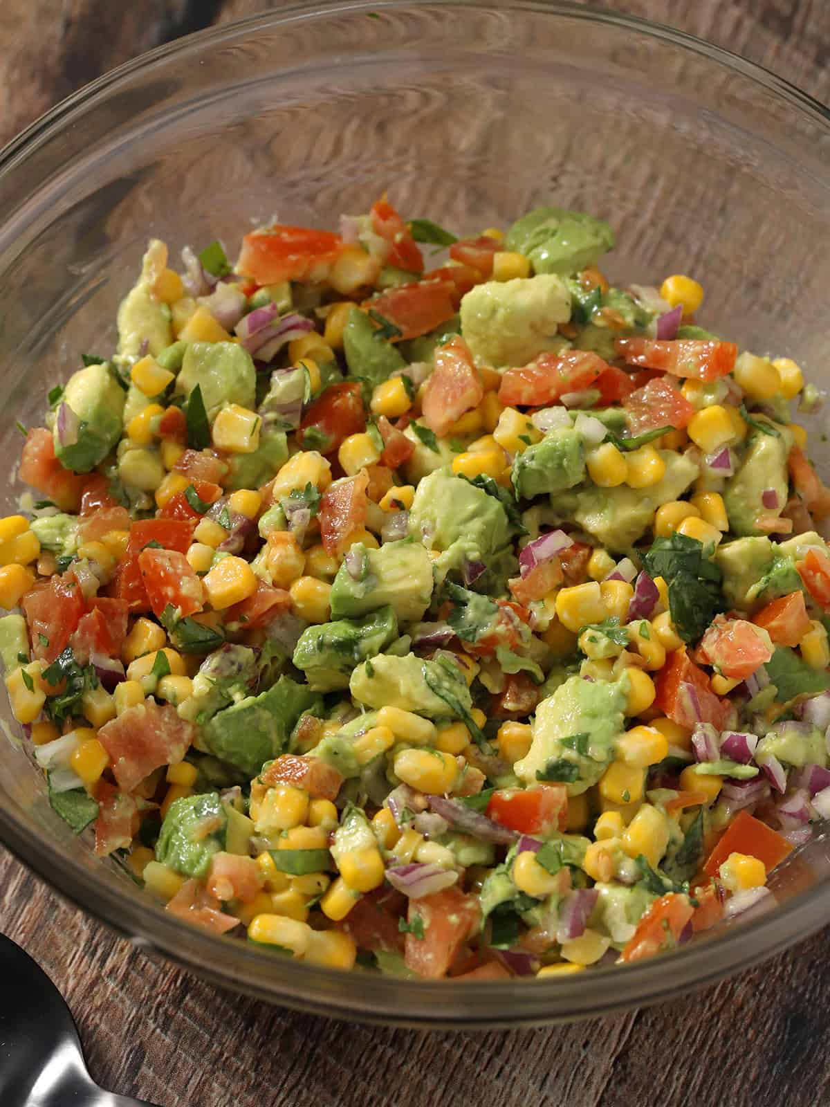 Avocado corn salsa all mixed together.