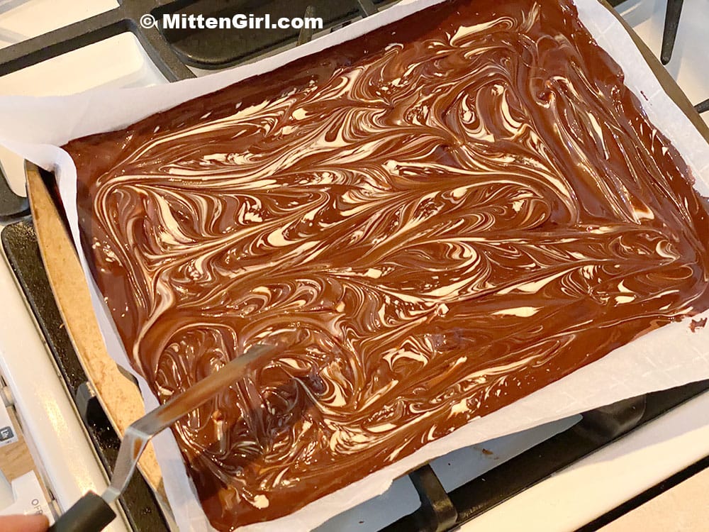 Swirl the chocolate together for the peppermint bark