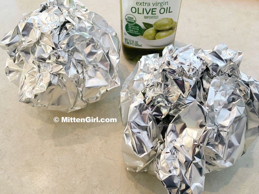 Raw garlic, wrapped in foil and ready for the oven. 