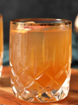 A glass of bourbon grapefruit cocktail.