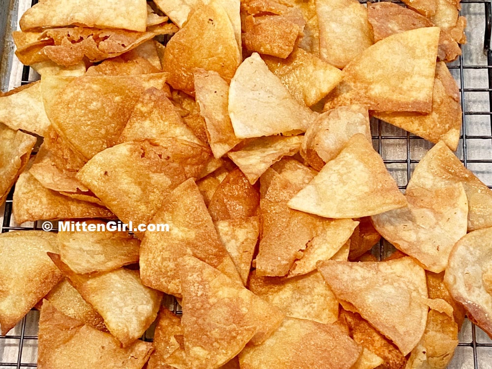 Tortilla chips fresh from the oil