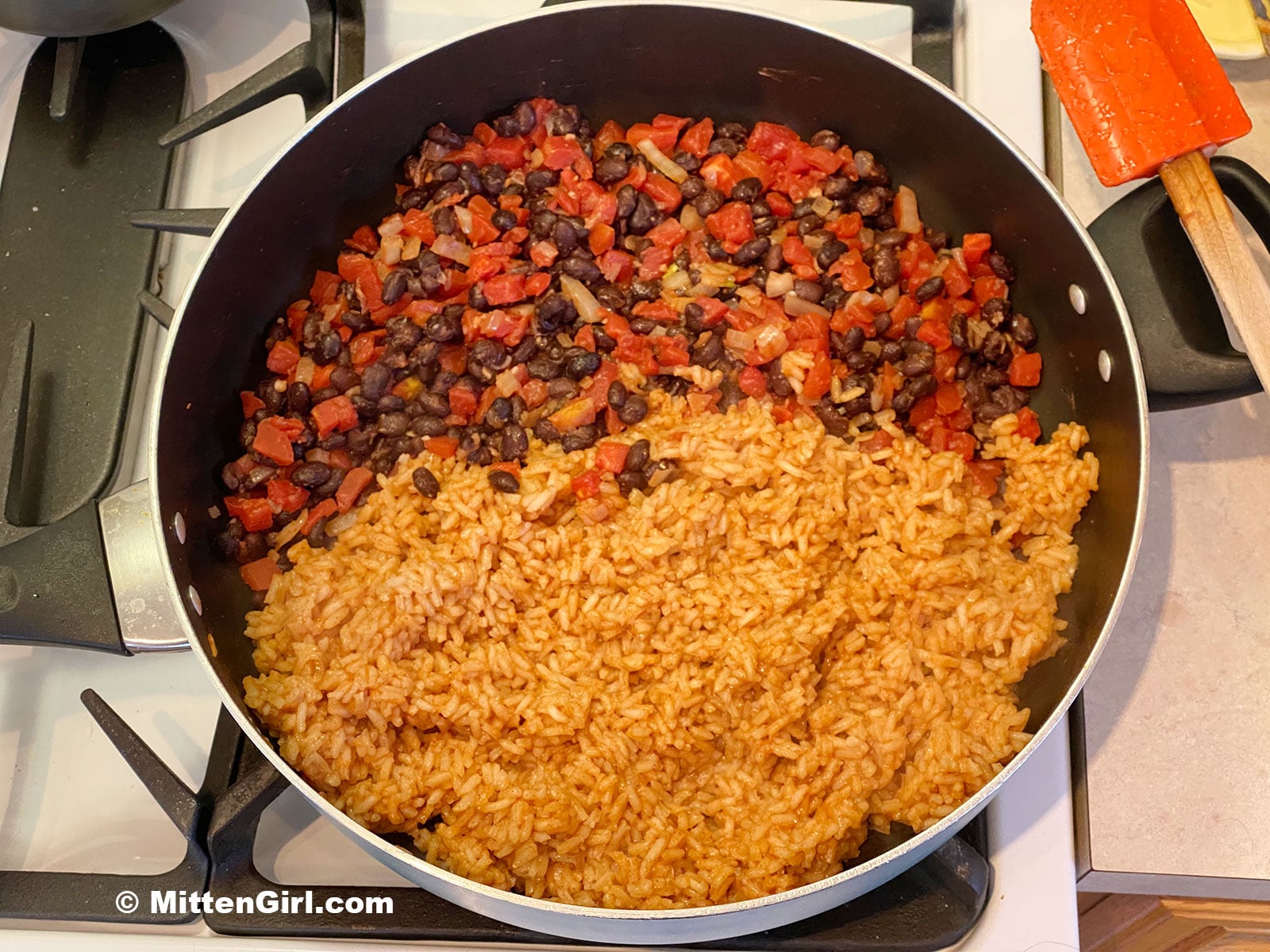 Tomatoes, beans and rice in a skillet