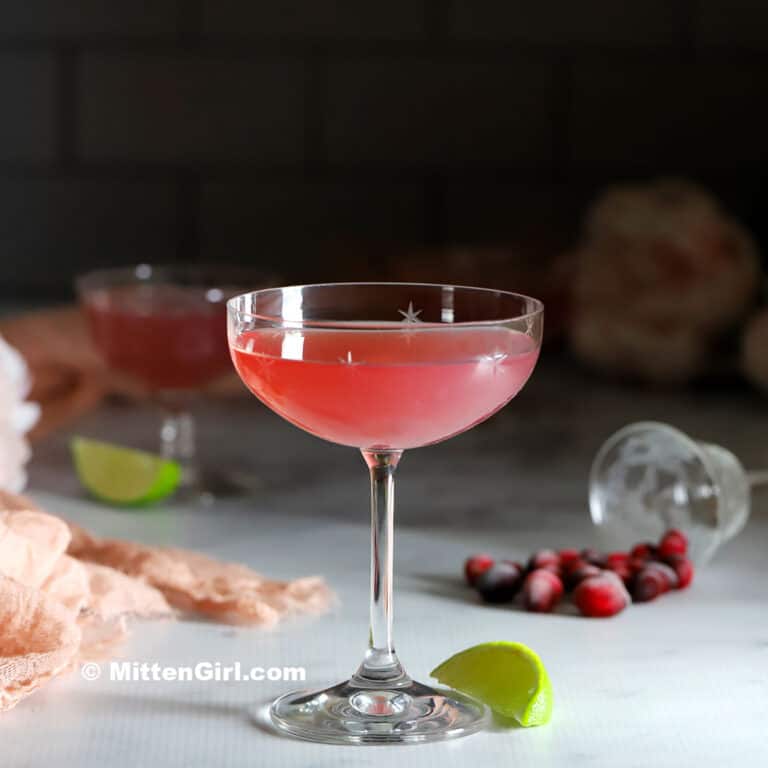A coupe glass of cosmopolitan cocktail. 