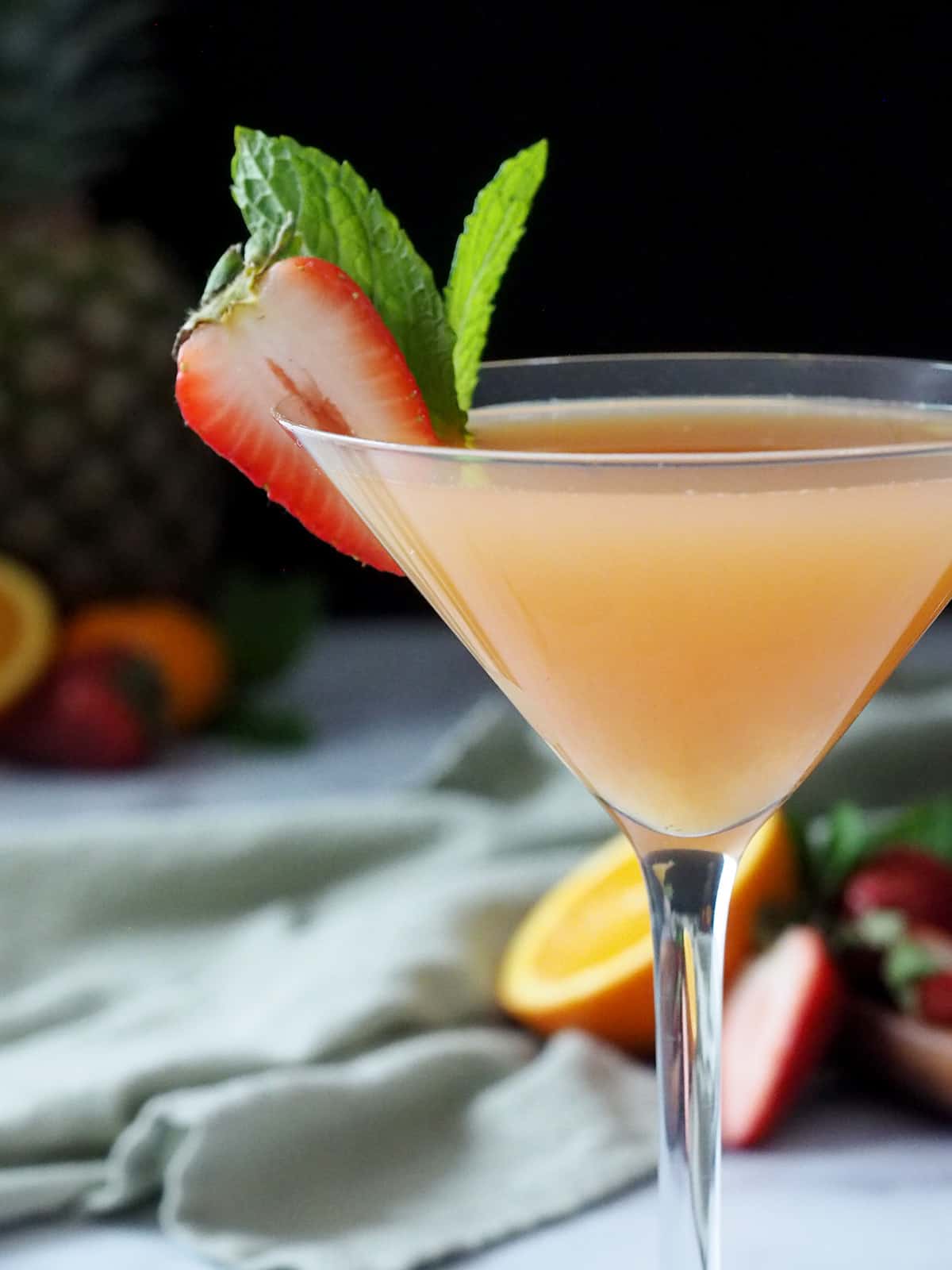 Garnish on a Strawberry Pineapple Martini. 