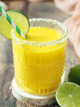 A glass of frozen mango margaritas.