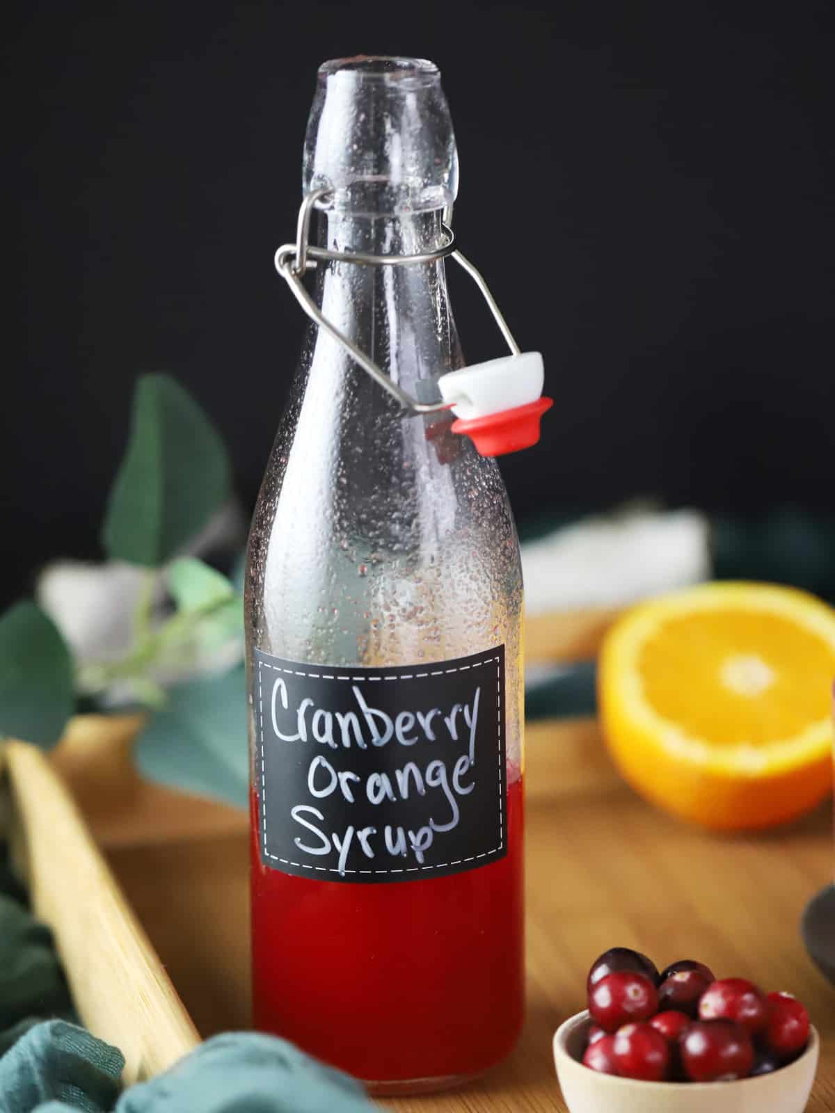 A bottle of cranberry orange syrup. 