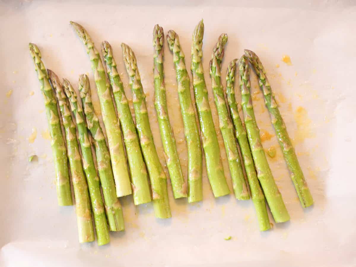 Asparagus on a baking sheet.