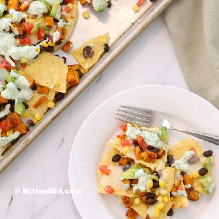 A plate of vegetarian nachos with sweet potatoes. 