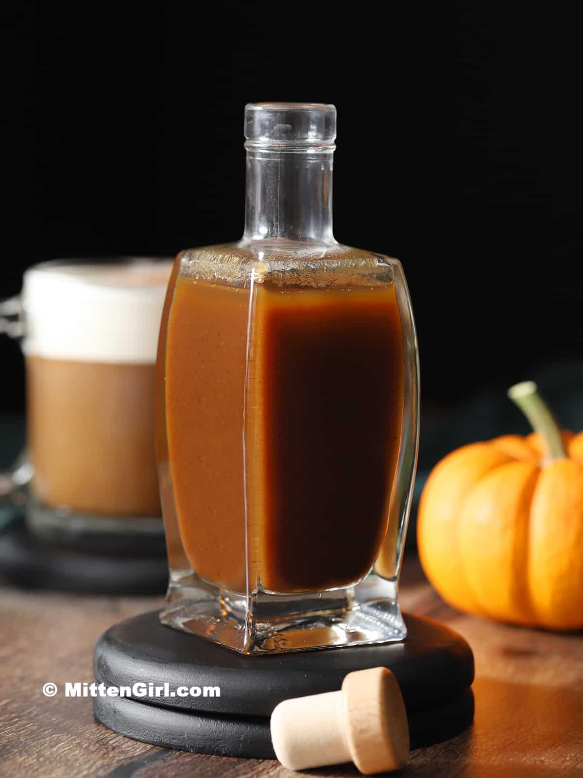 A jar of pumpkin spice syrup.
