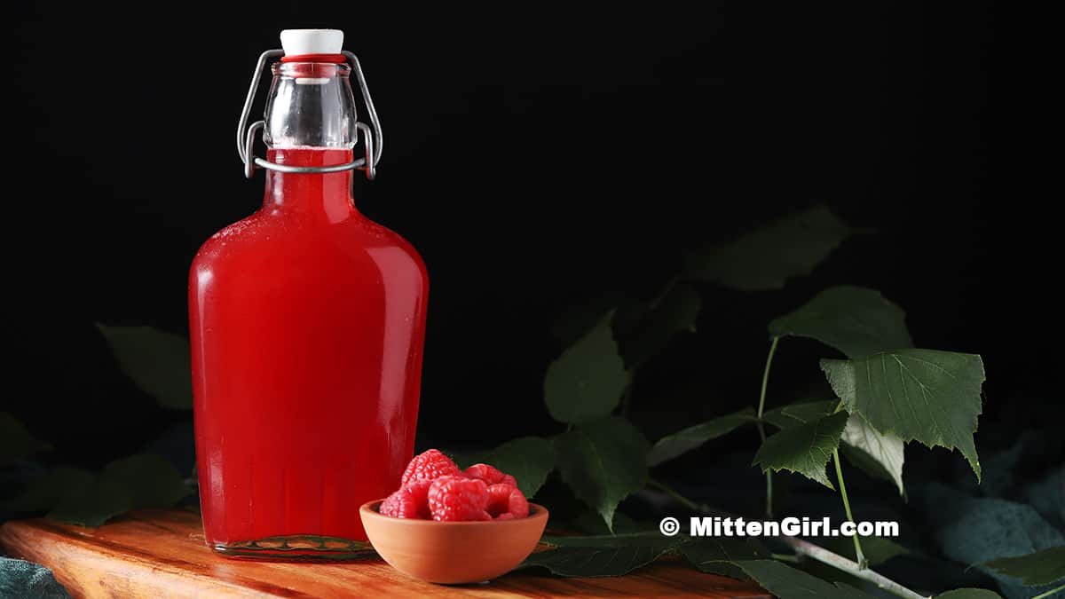A bottle of raspberry simple syrup.