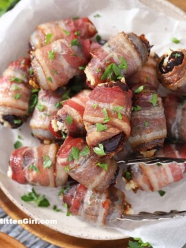 A plate of bacon wrapped dates.