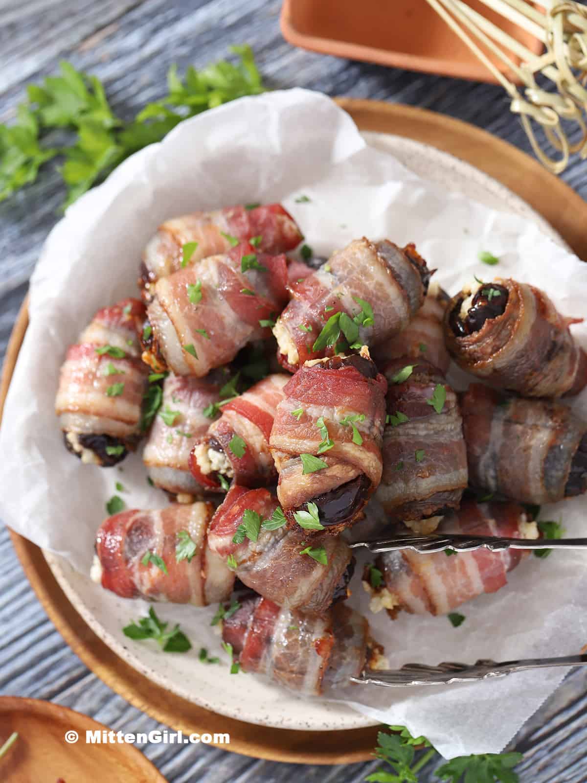 A plate of bacon wrapped dates. 