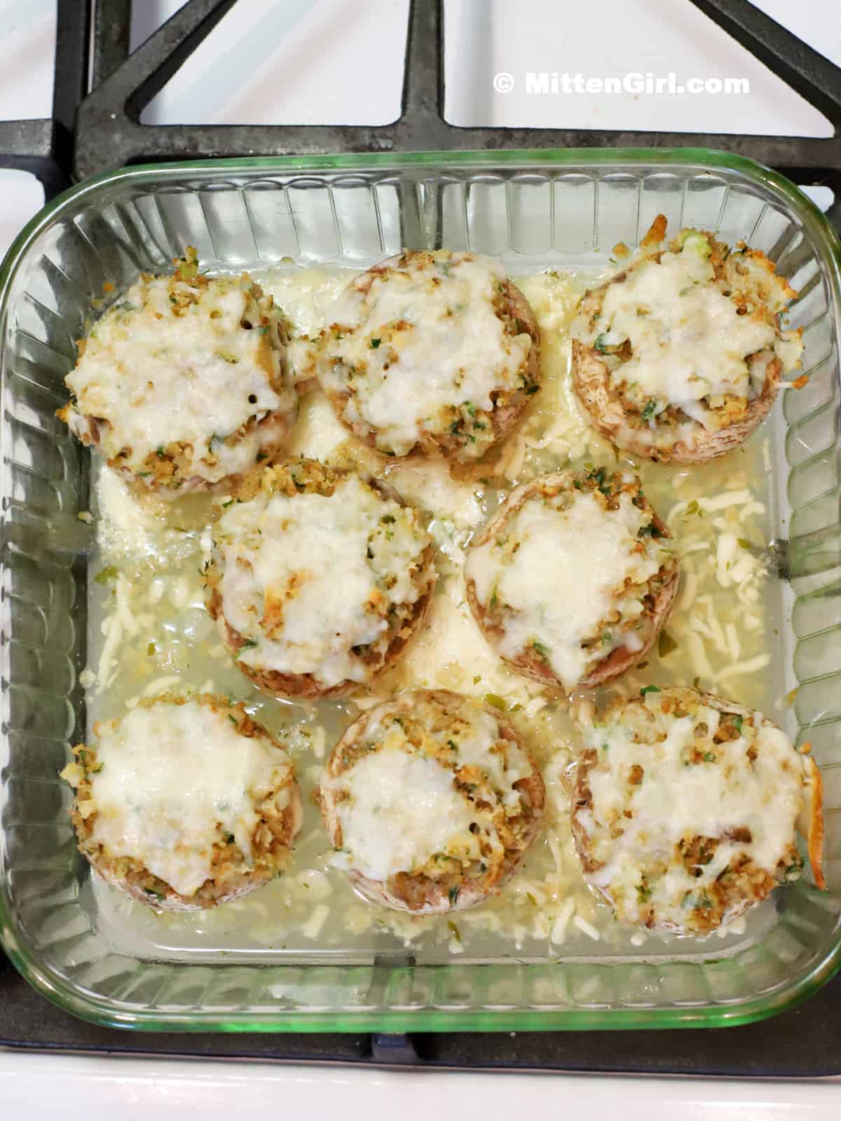 Stuffed mushrooms covered with cheese, fresh from the oven.
