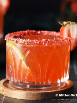 A glass of strawberry margarita.