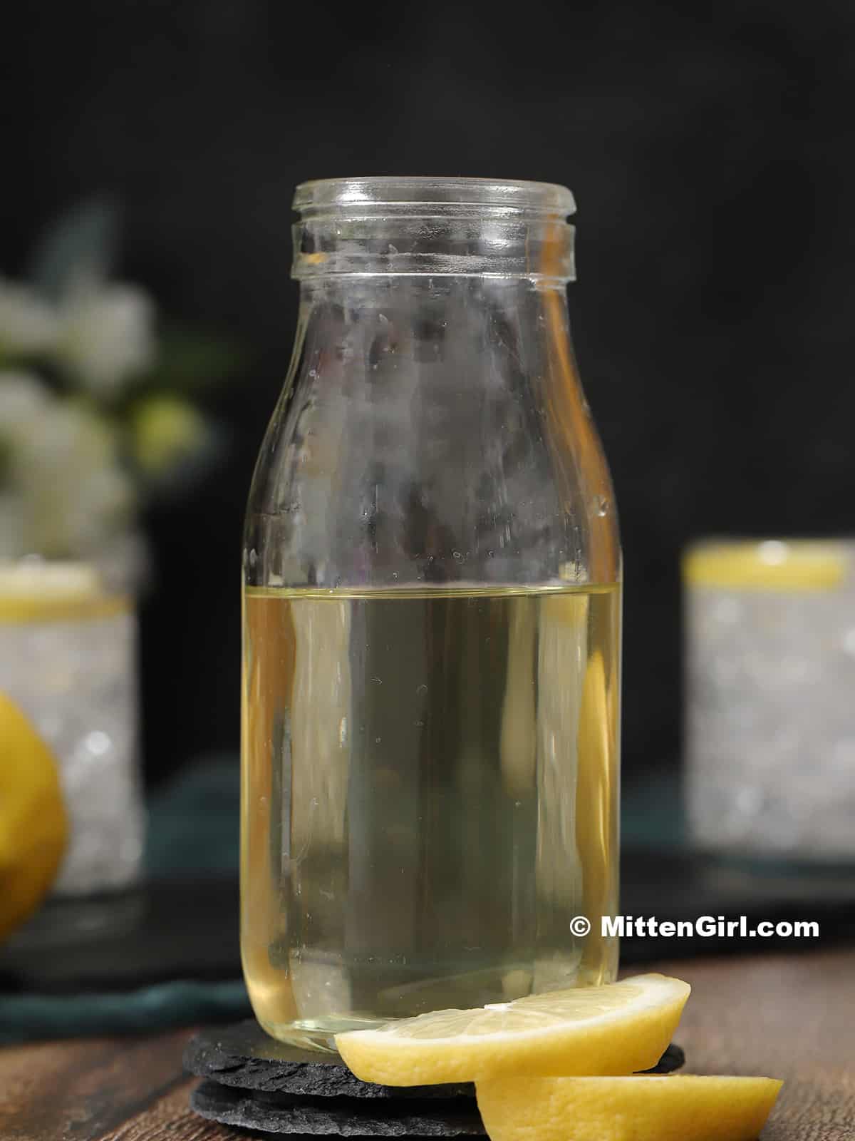 A jar of lemon syrup. 