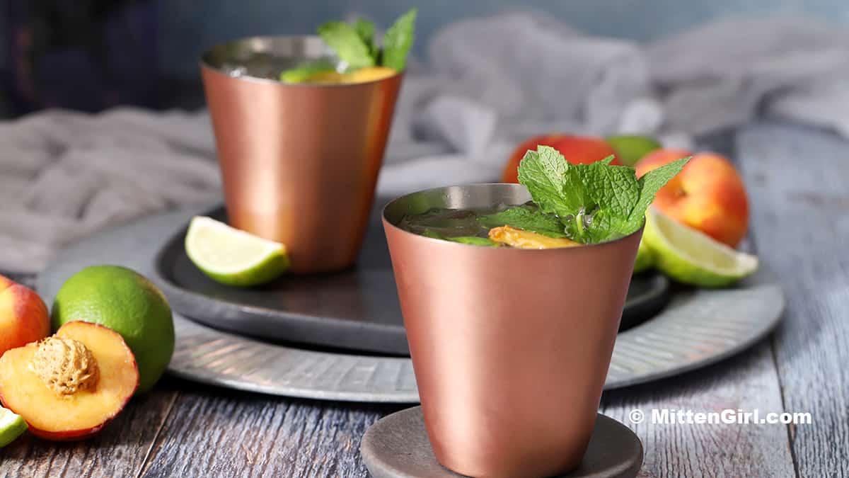 Glasses of Peach Moscow Mules