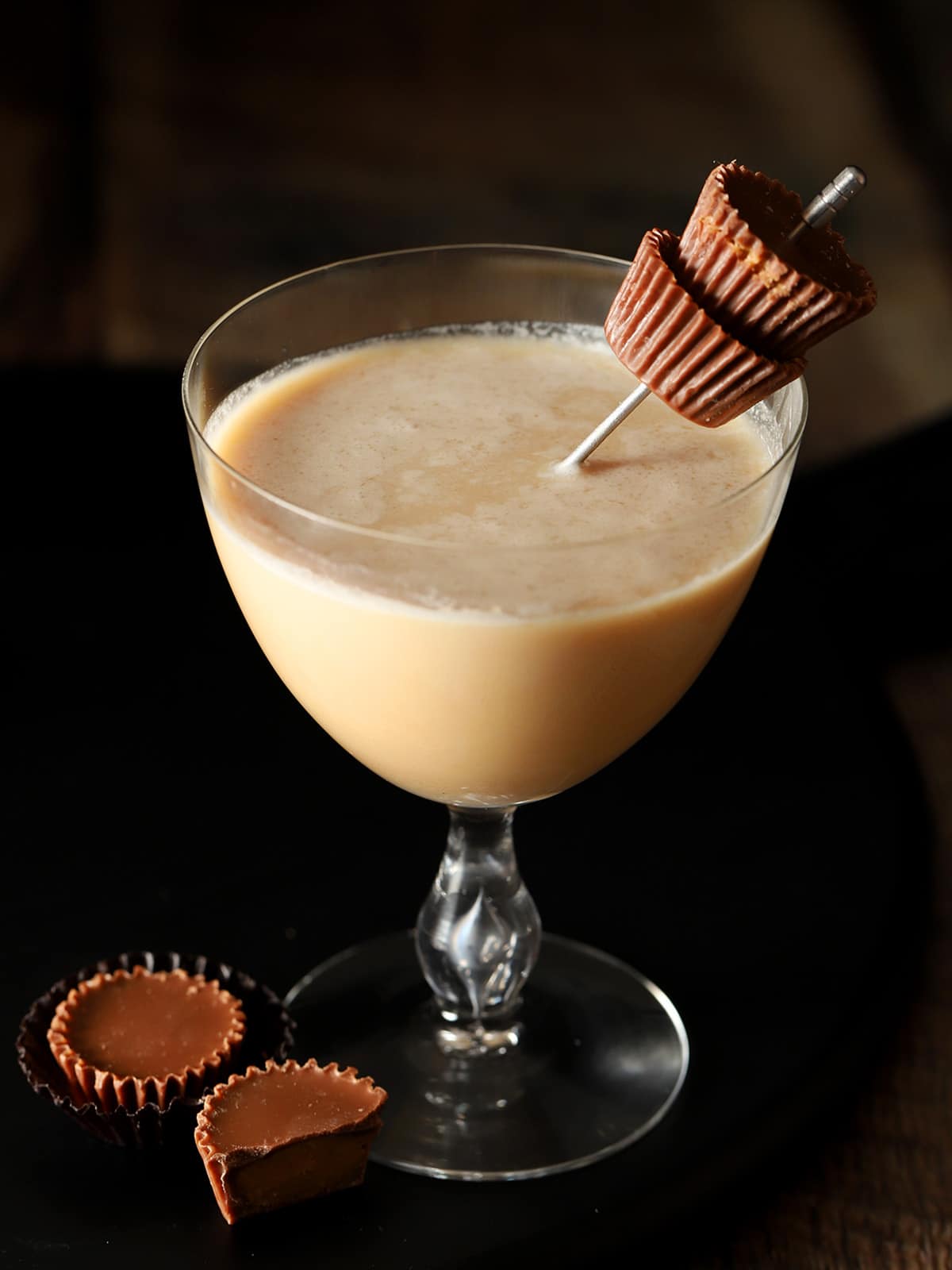 A glass of chocolate and peanut butter whiskey cocktail. 