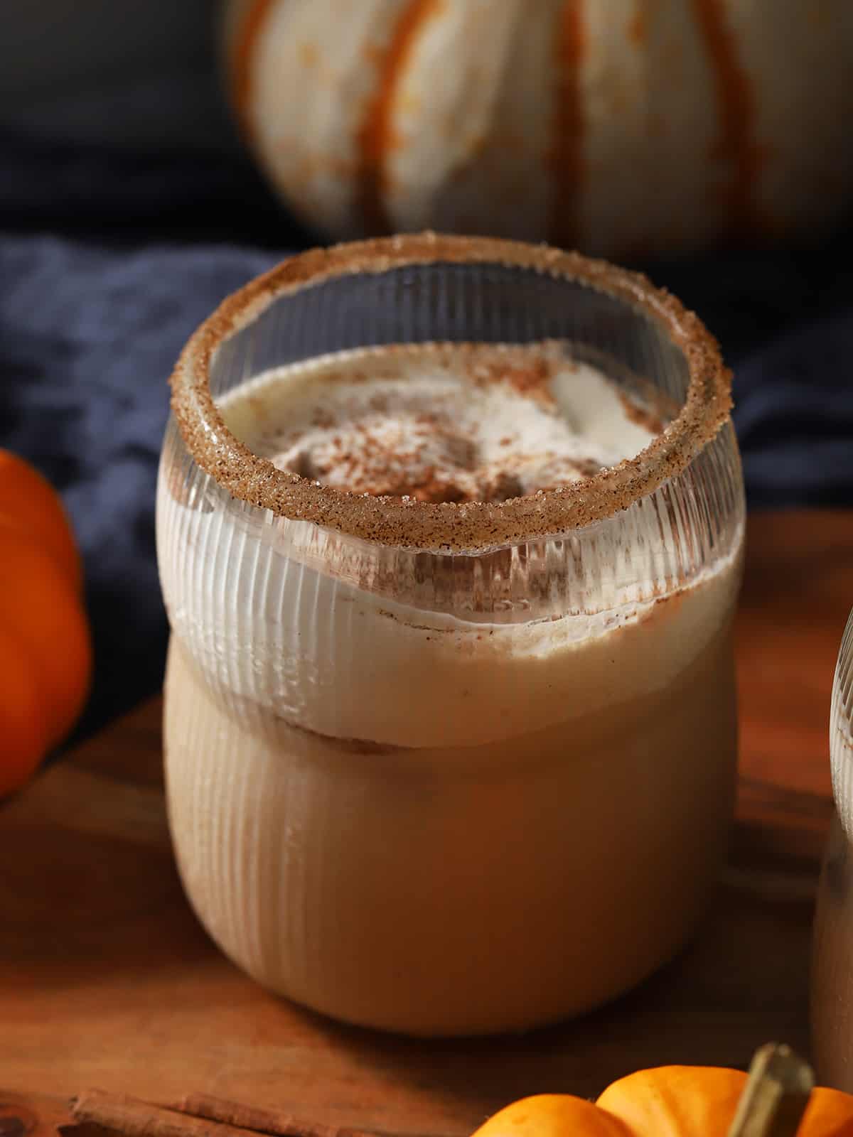A glass of pumpkin spice white Russian cocktail. 