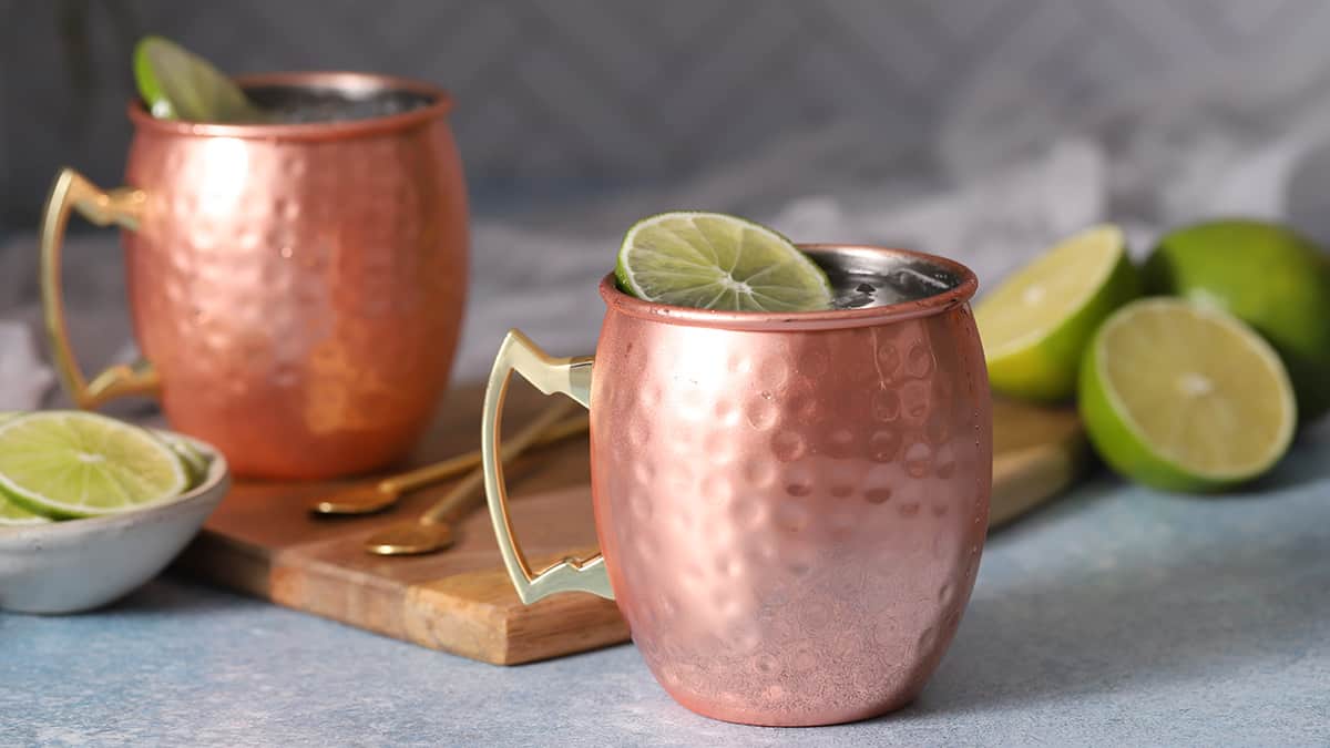 Copper mugs filed with Moscow Mule cocktails. 