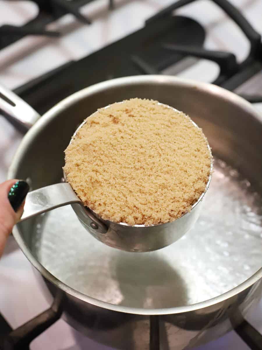 Brown sugar over a pot of simmering water.
