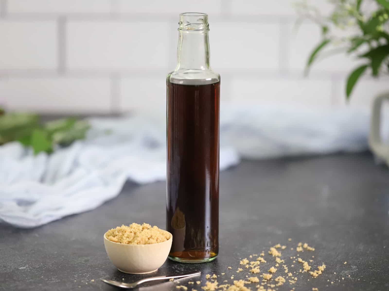 A tall bottle of brown sugar syrup.