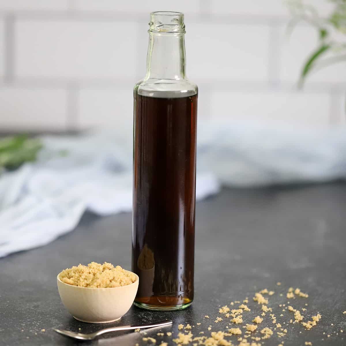 A tall bottle of brown sugar syrup.