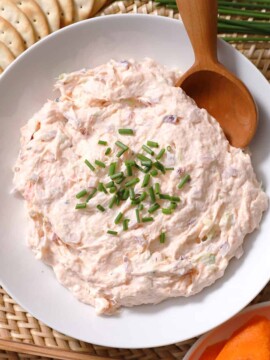 A white bowl filled with smoked salmon dip.