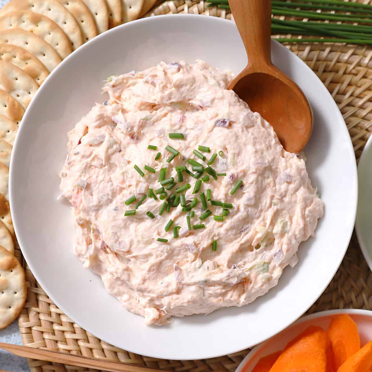 A white bowl filled with smoked salmon dip.