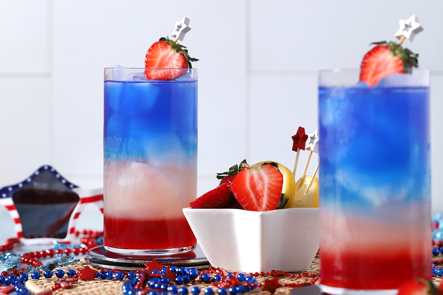 A pair of red, white and blue drinks.